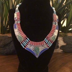 inlaid mosaic of red Coral and Turquoise gemstones